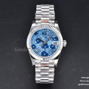 DateJust 31mm 904L GMF lunette cannelée cadran fleurs bleues bracelet President A2824