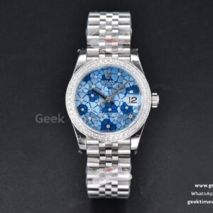 DateJust 31mm 904L GMF lunette diamants cadran fleurs bleues bracelet Jubilee A2824