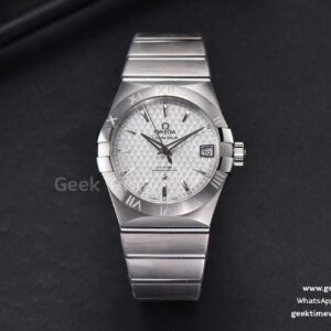 Constellation VSF 38mm esfera blanca texturizada brazalete SS A8500